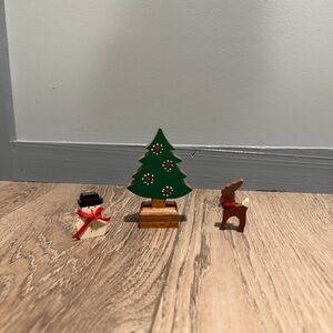 Vintage wooden Christmas decor tree snowman and reindeer.